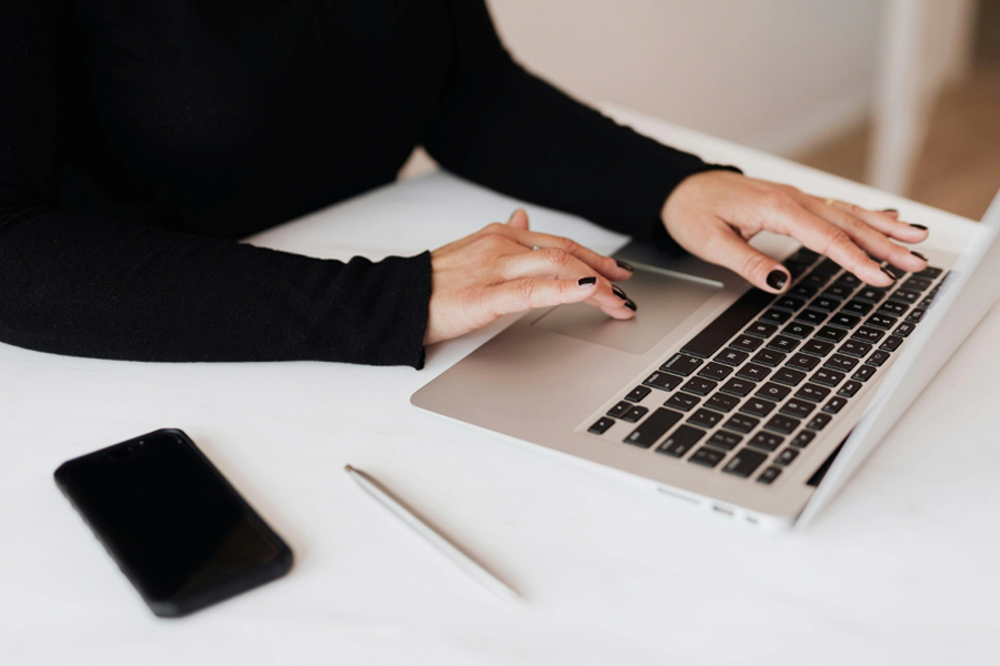 A woman using a laptop